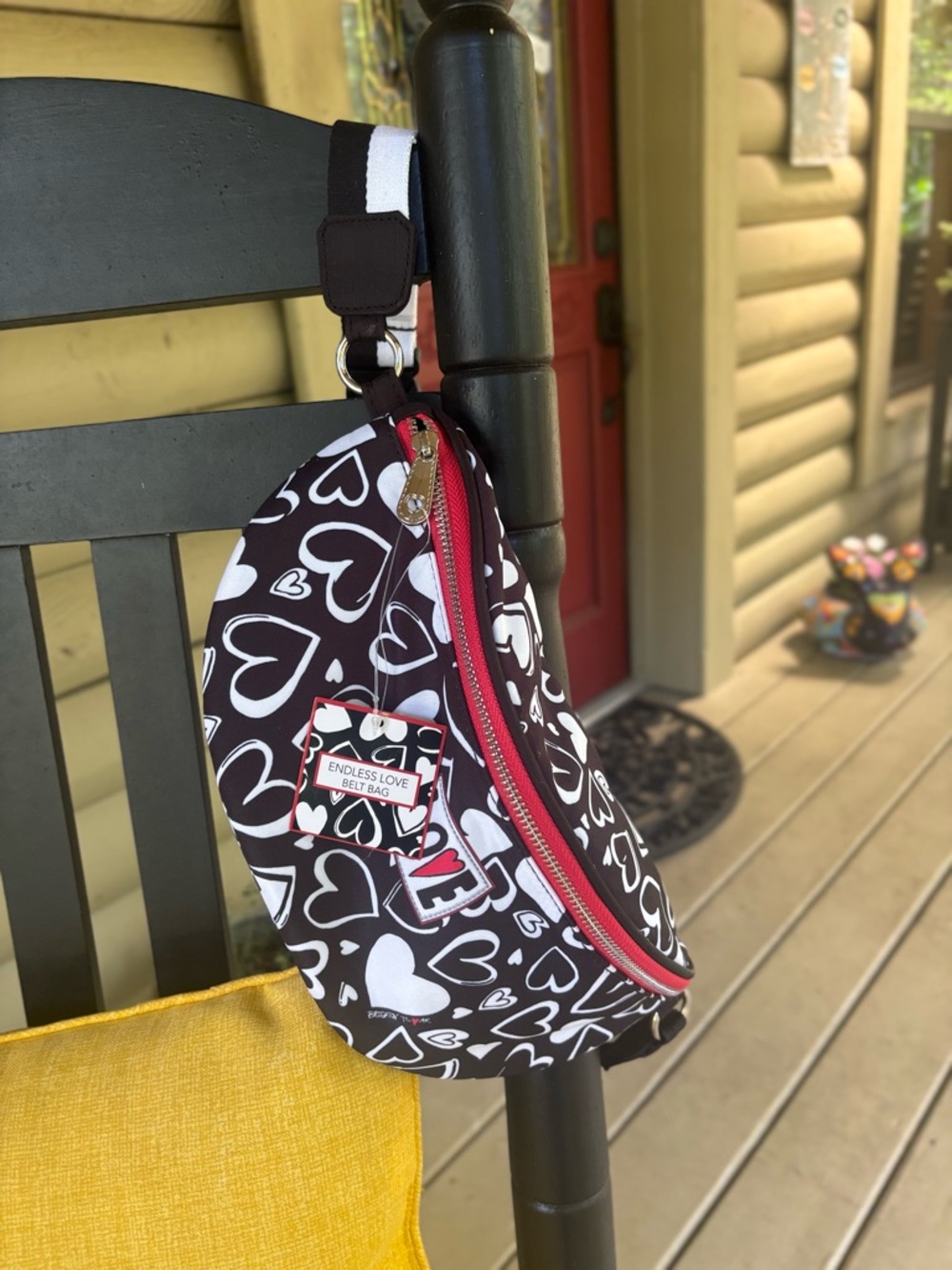 Brighton Black Sling Bag with White Hearts and Pink Zipper